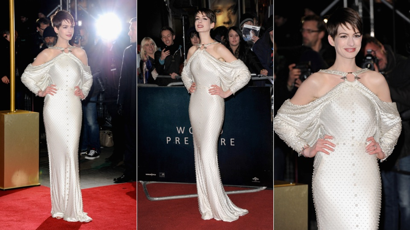 Illustration for article titled Anne Hathaway's Dress Was as Ridiculous as a Castle on a Cloud at the Les Mis Premiere